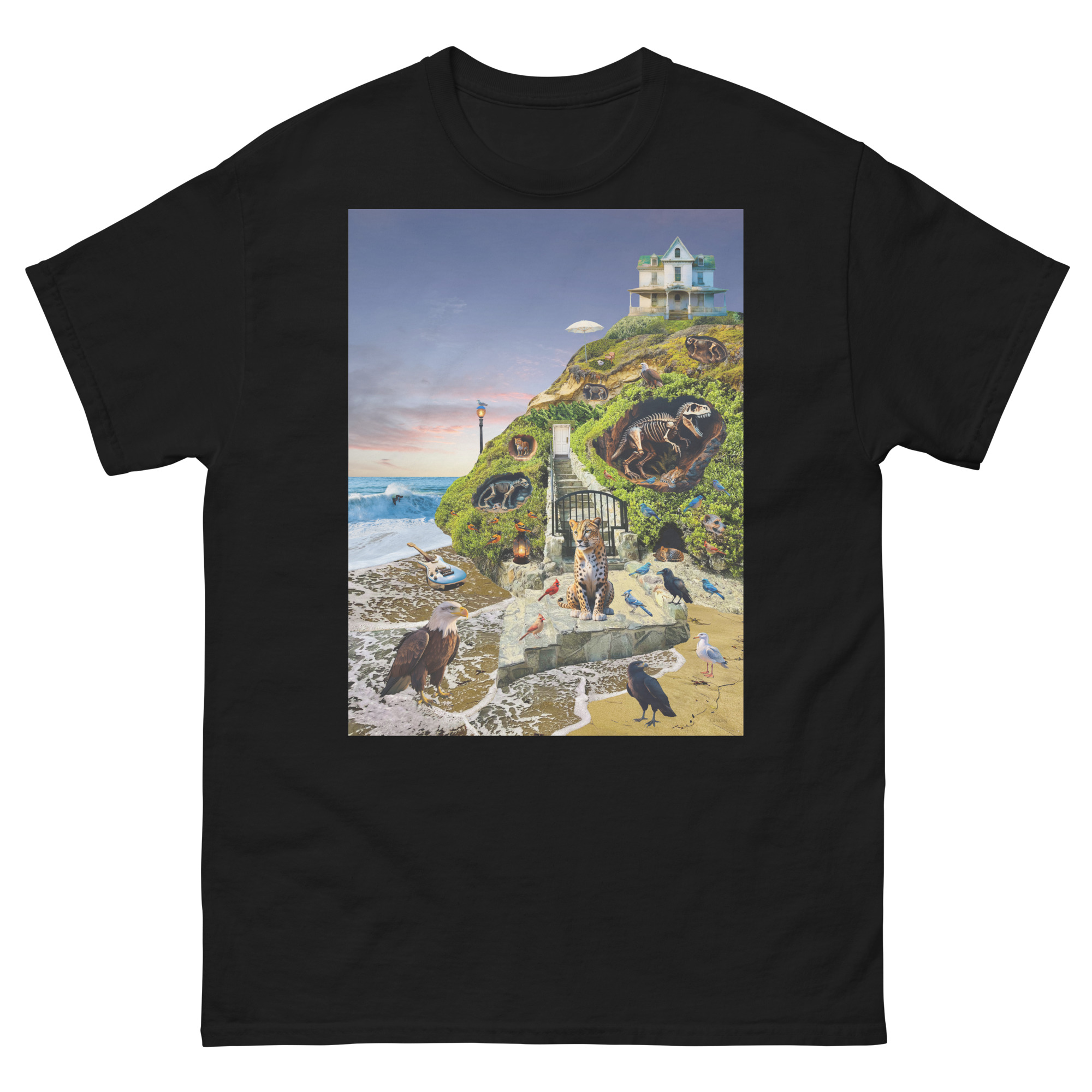 Black T-shirt featuring whimsical seaside cliff illustration