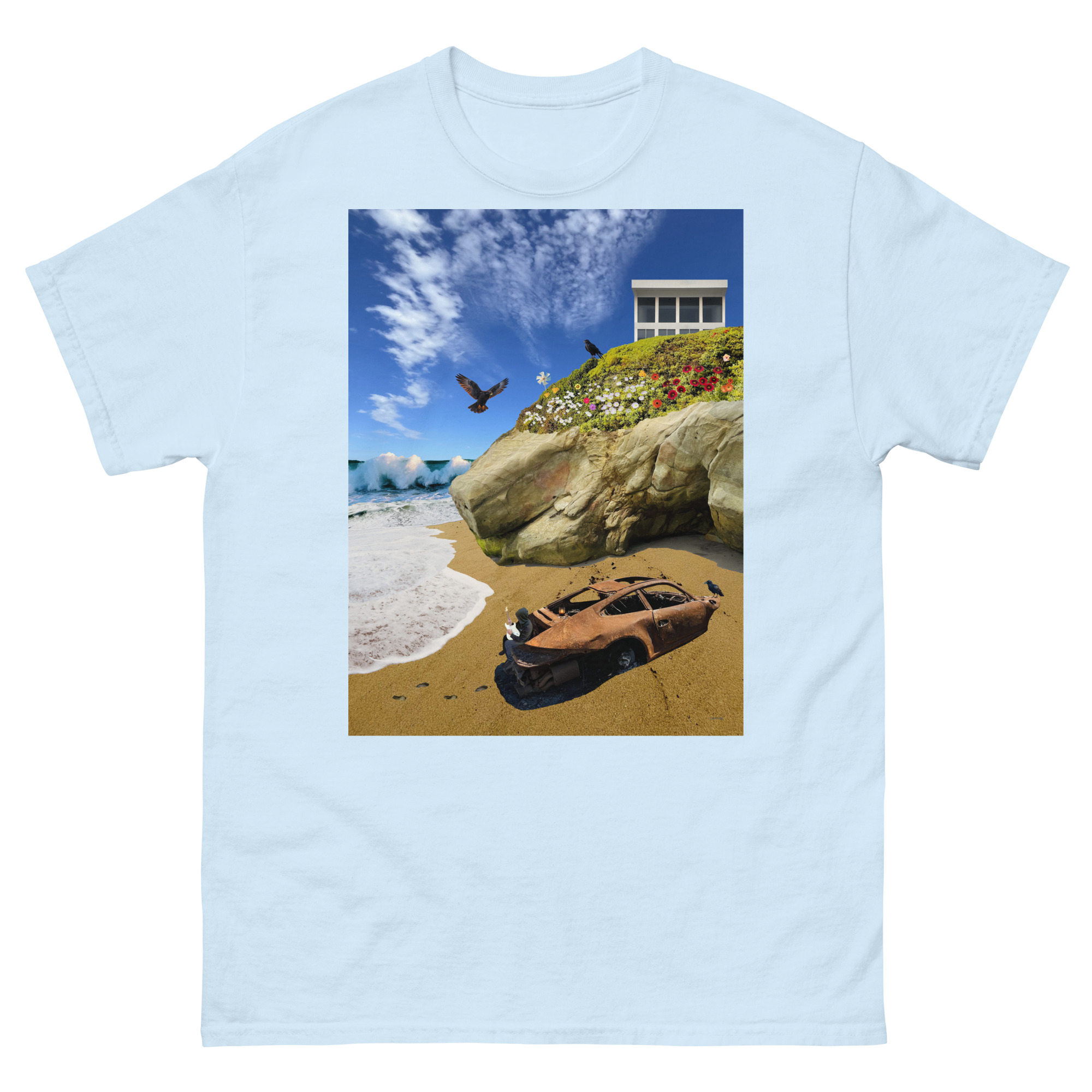 Rusty car on sandy beach beneath cliff