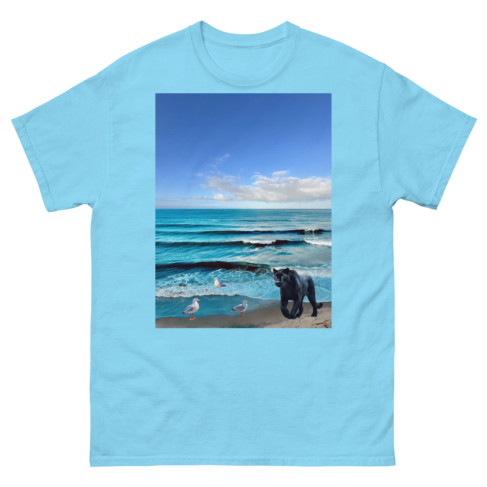Light blue t-shirt with beach scene, dog, seagulls